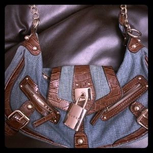 Cute purse with pad lock.